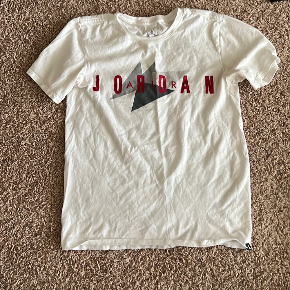 Small used white Jordan shirt.